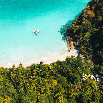 Aerial view of a tropical beach and clear water